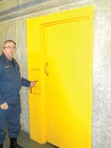 The yellow door leading to the execution chamber.